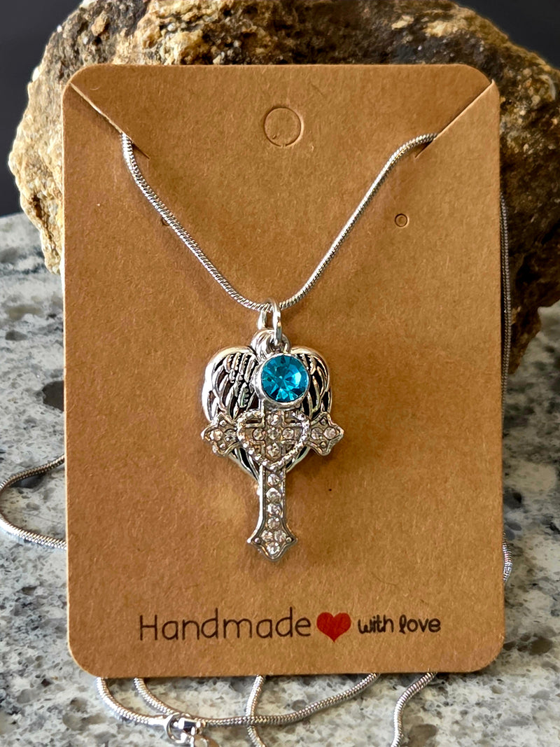 Remembrance pendant necklaces with angel wings, butterfly, cross, and birthstone charms